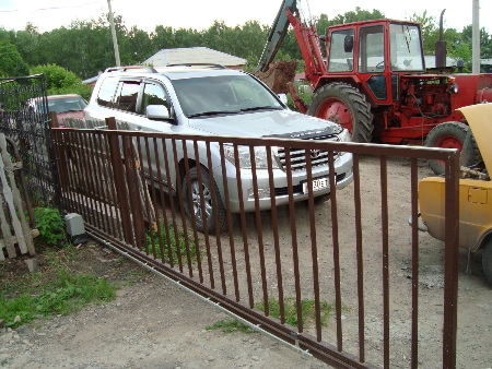 Ворота откатные, профлист и решетки  в Красноярске